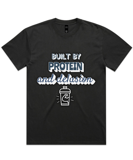 ”BUILT BY PROTEIN & DELUSION” – Unisex Oversized Pumpcover Tee